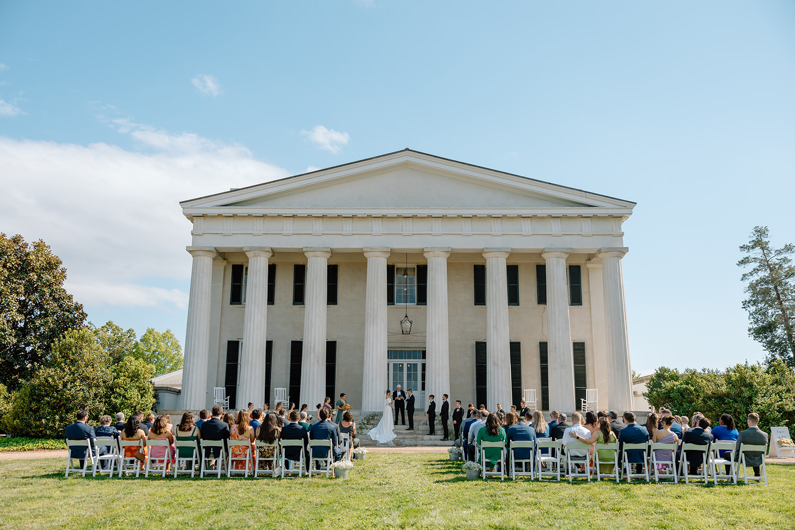 Ceremony on the steps of the historic Berry Hill Resort wedding venue in virginia